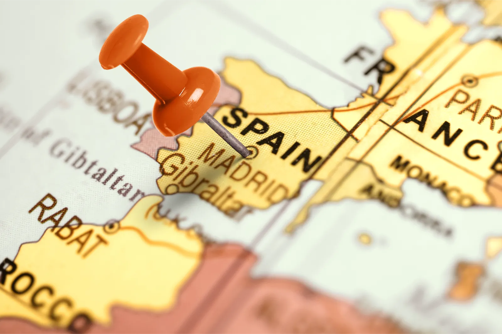 Things to know before moving to Spain represented by a pin in Spain on a map.